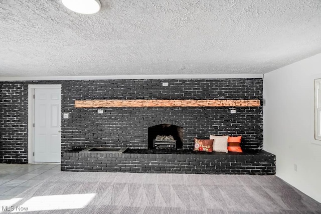 unfurnished living room featuring tile patterned flooring and a fireplace