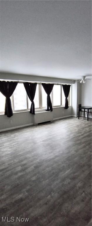 unfurnished room featuring a wealth of natural light