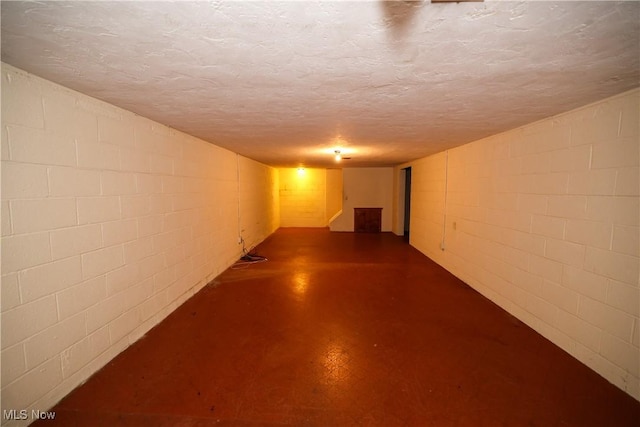 basement with a textured ceiling