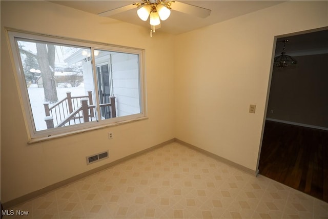 empty room with ceiling fan