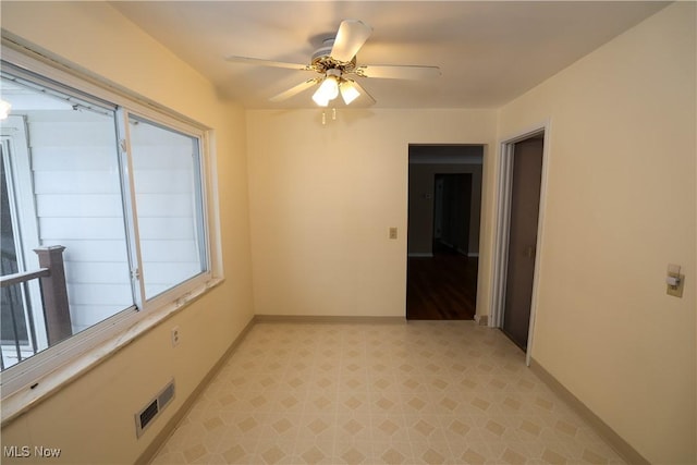 empty room with ceiling fan