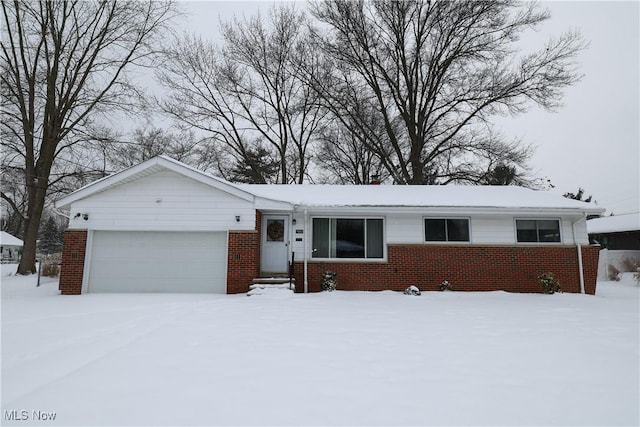 single story home with a garage