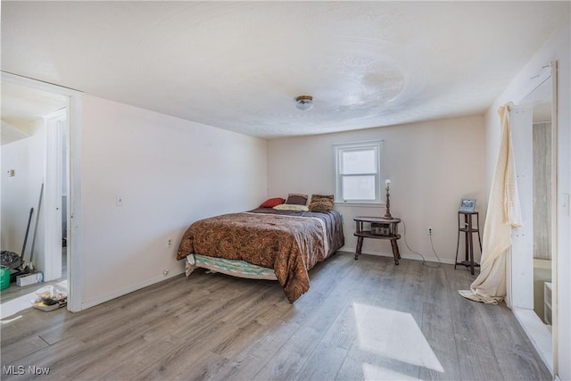 bedroom featuring light hardwood / wood-style flooring