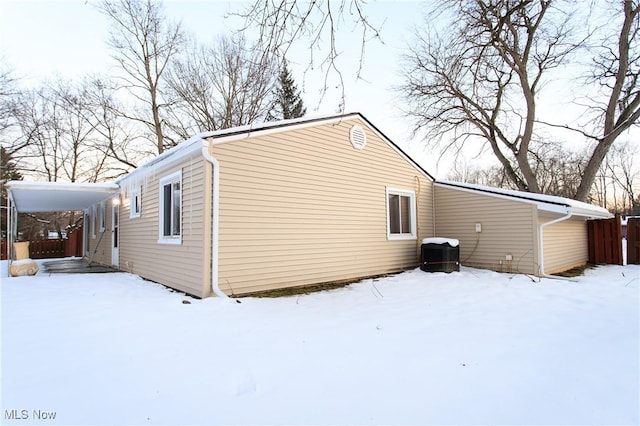 view of snow covered property