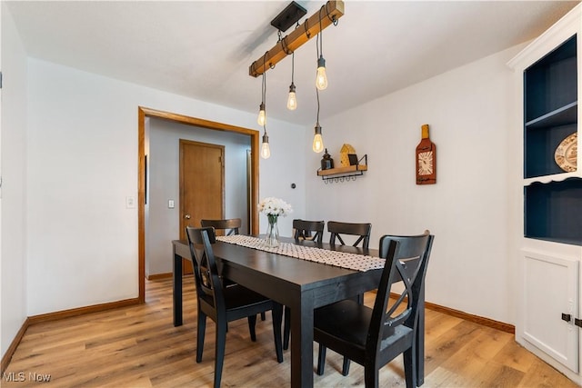 dining room featuring light wood-type flooring