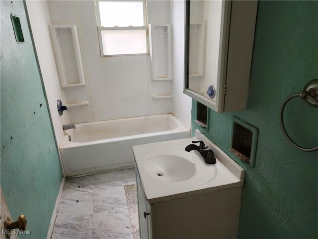 bathroom featuring tub / shower combination and vanity