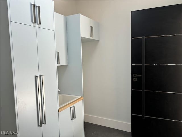 kitchen with white cabinets and sink