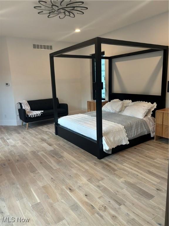 bedroom featuring light hardwood / wood-style flooring