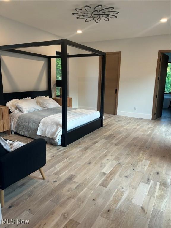 bedroom featuring light wood-type flooring