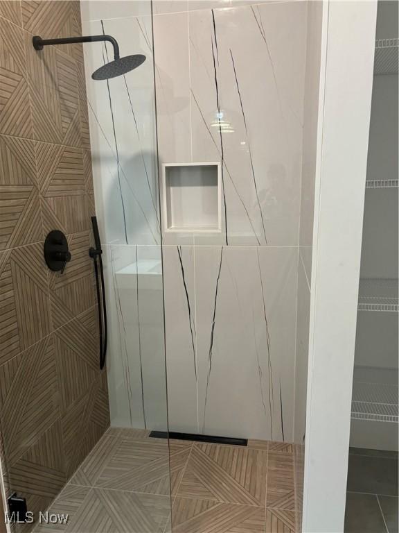 bathroom with a shower