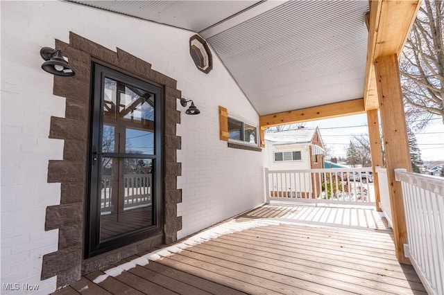 wooden terrace featuring a porch