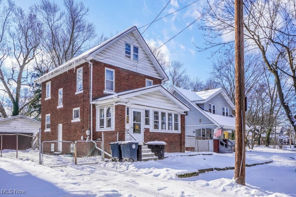 view of snow covered house