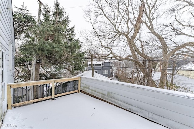 view of snow covered deck