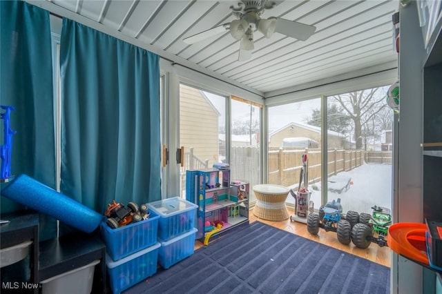 rec room featuring ceiling fan and hardwood / wood-style flooring