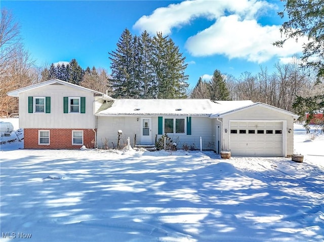 split level home featuring a garage