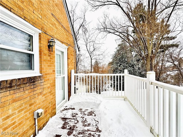 view of snow covered deck