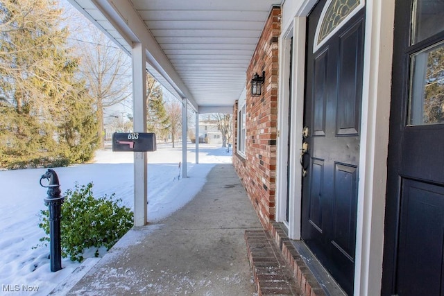 view of snow covered patio