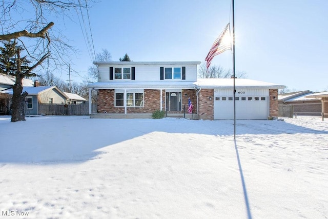 front of property with a garage