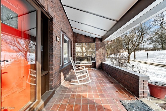 view of snow covered patio