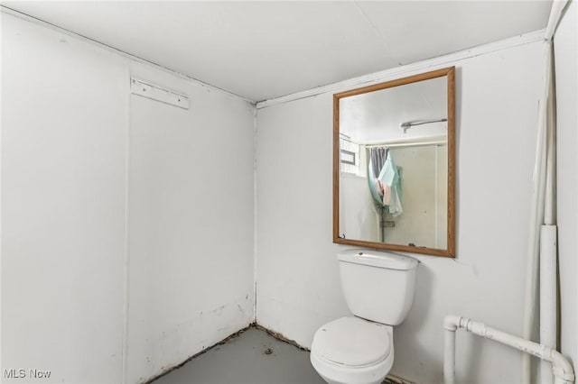 bathroom featuring toilet