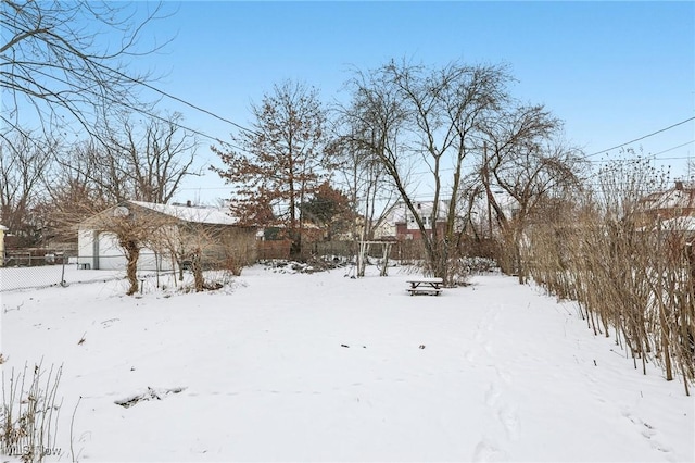 view of yard covered in snow