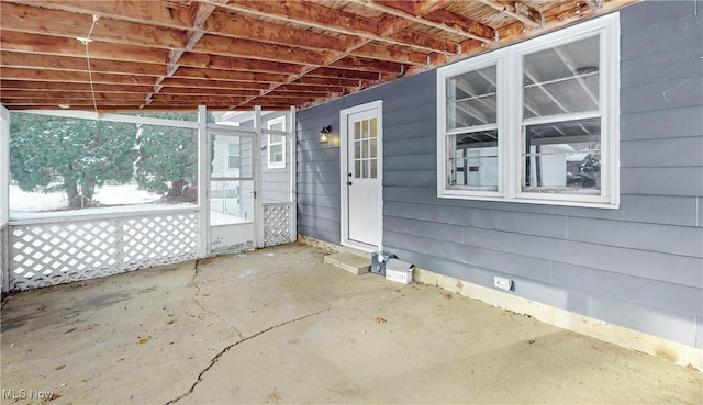 exterior space featuring vaulted ceiling