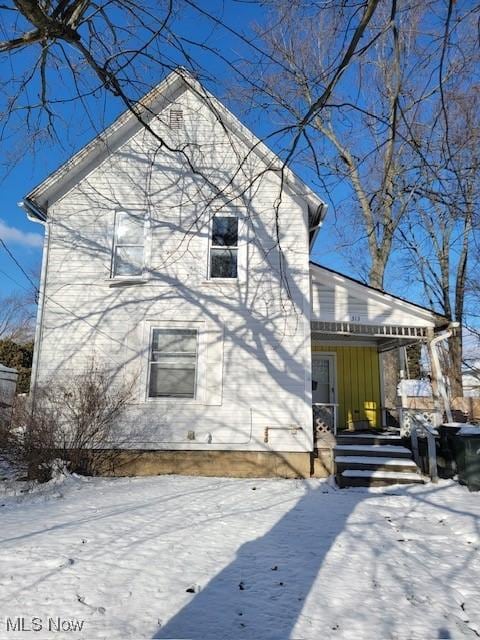 exterior space featuring covered porch