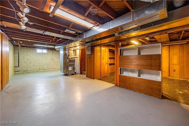 basement featuring heating unit