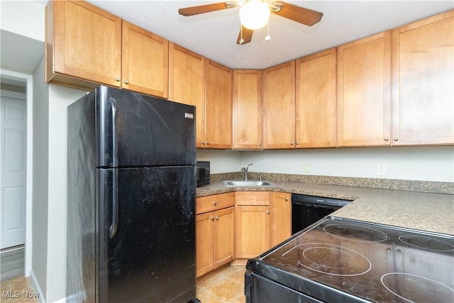 kitchen featuring ceiling fan, sink, light brown cabinetry, and black appliances