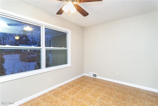 empty room with ceiling fan