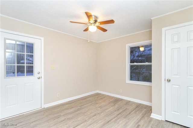 unfurnished room with ceiling fan, ornamental molding, and light hardwood / wood-style floors