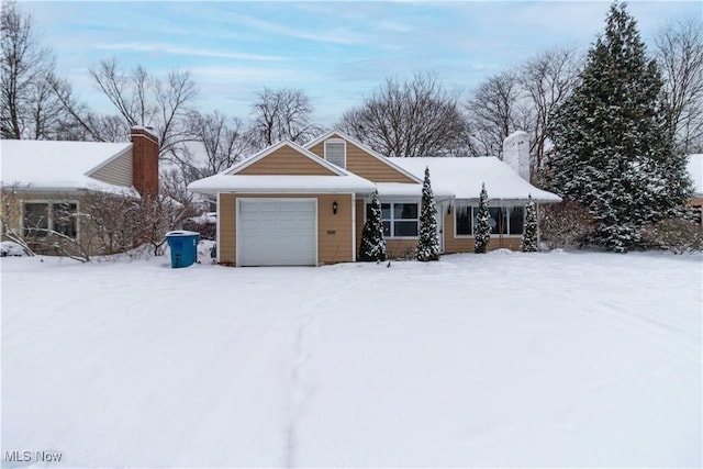 view of front of home with a garage