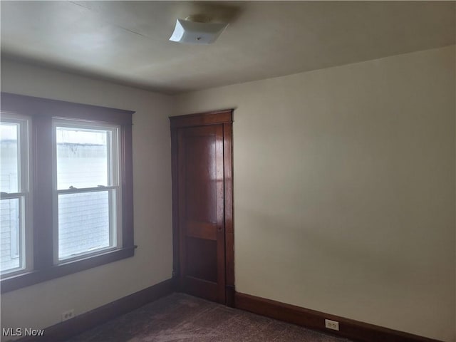 view of carpeted spare room