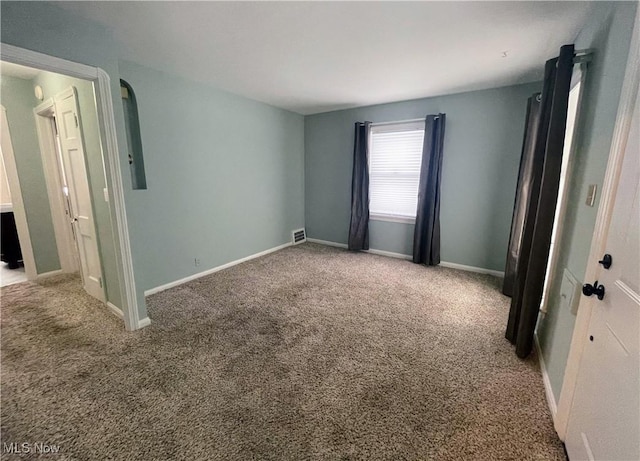 unfurnished bedroom featuring carpet floors