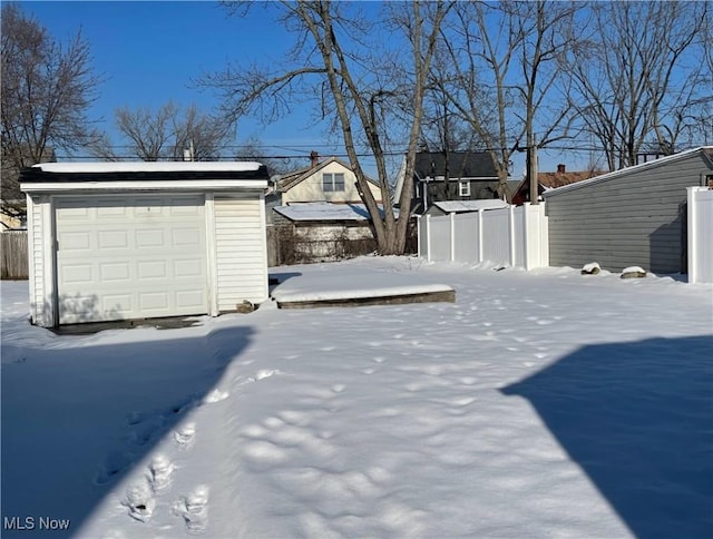 exterior space featuring an outdoor structure and a garage