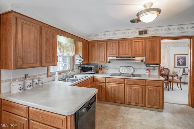 kitchen featuring decorative backsplash, sink, and black appliances