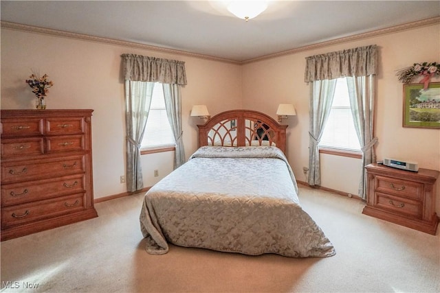 bedroom featuring light colored carpet, multiple windows, and crown molding