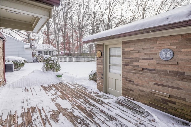 view of snow covered deck