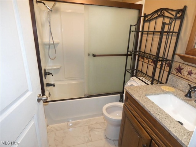 full bathroom with toilet, vanity, and shower / bath combination with glass door