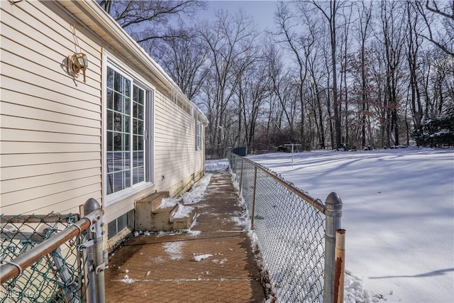 view of yard covered in snow