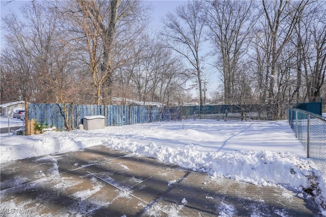 view of yard covered in snow