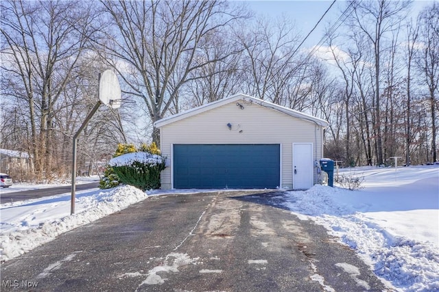 view of snow covered garage