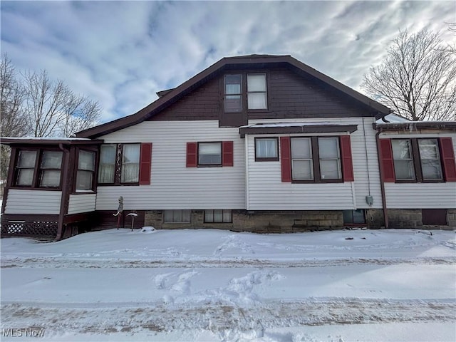 view of snow covered property