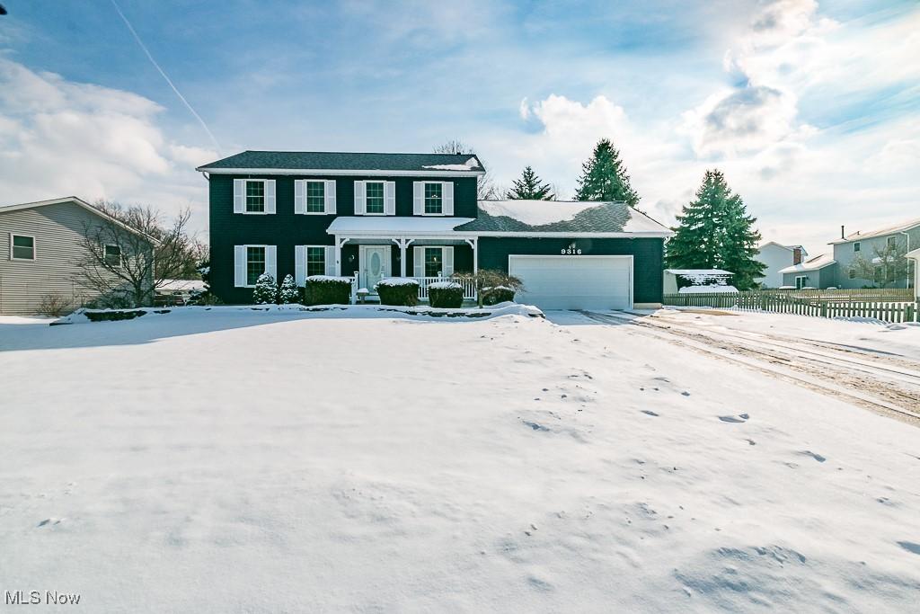 colonial home featuring a garage