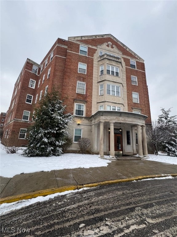 view of snow covered building