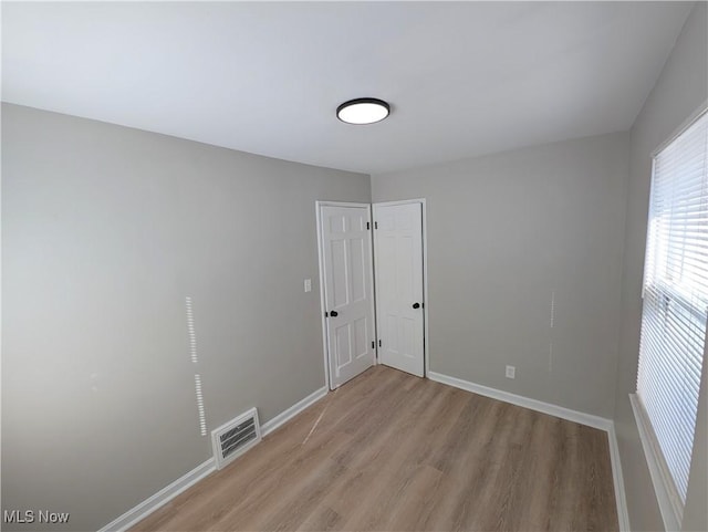 empty room featuring light hardwood / wood-style flooring