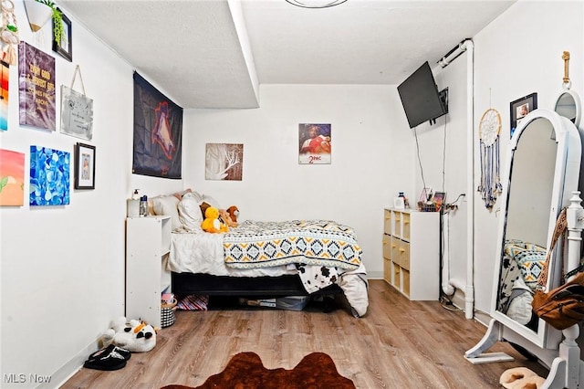 bedroom featuring light hardwood / wood-style floors