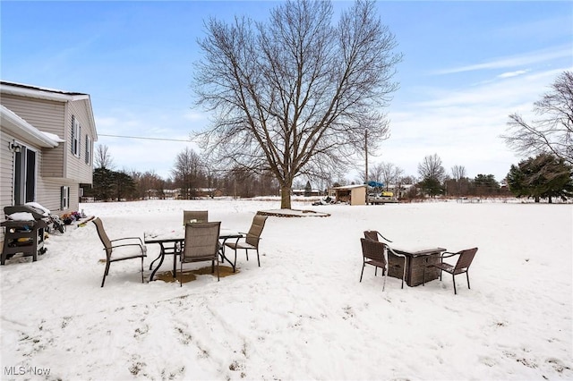 view of yard covered in snow