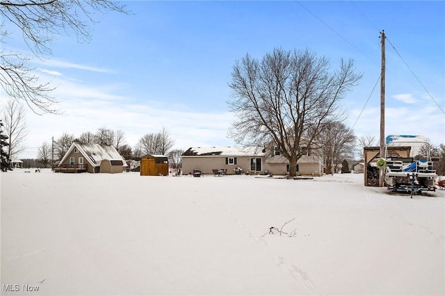 view of yard covered in snow