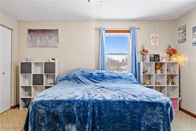 bedroom featuring a textured ceiling